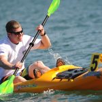 One way for boat dealers to engage younger buyers is to start them with kayaks and paddleboards.